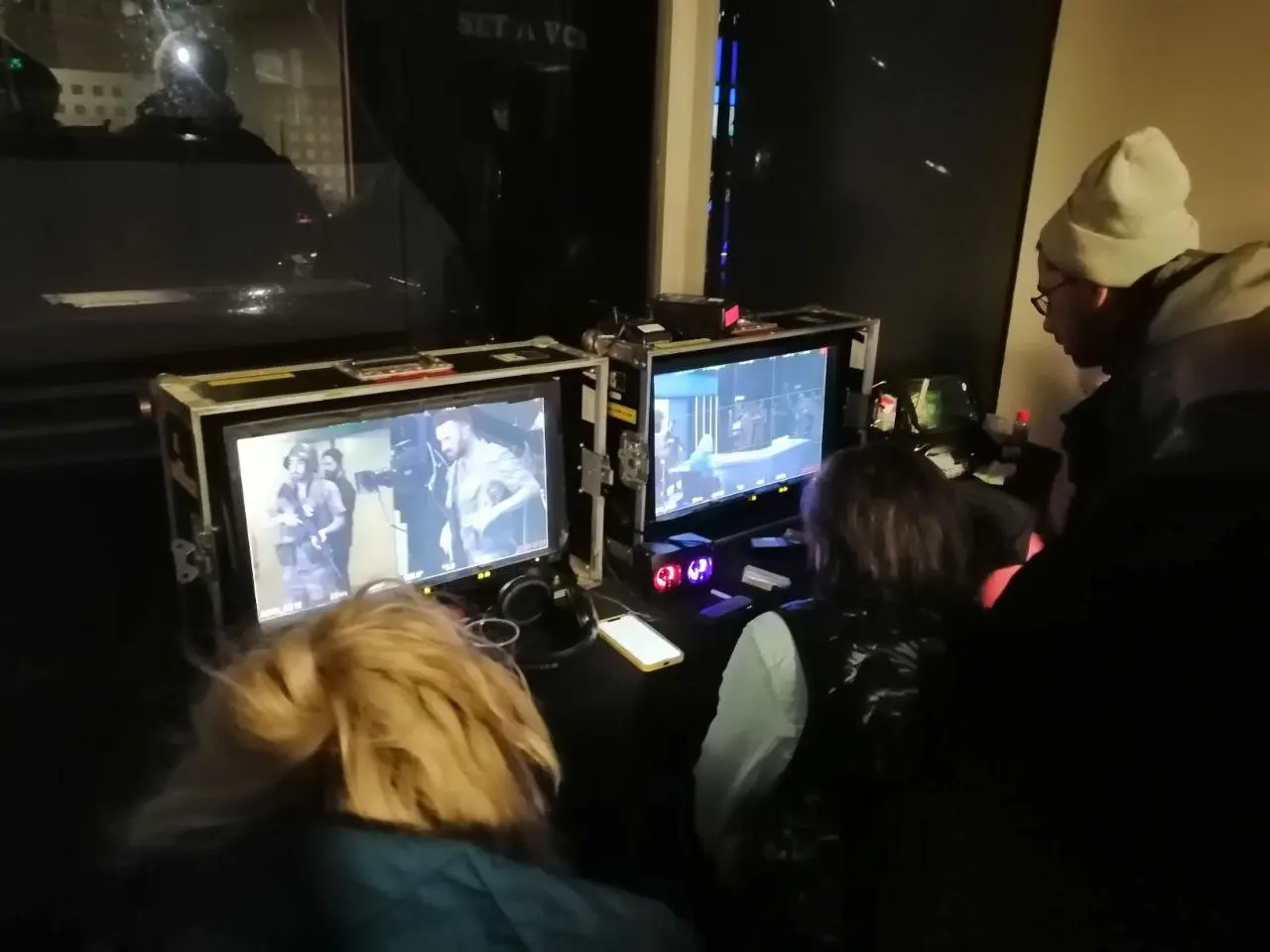 Behind-the-scenes look at the production team collaborating on set at MediaCity, surrounded by professional-grade filming equipment.